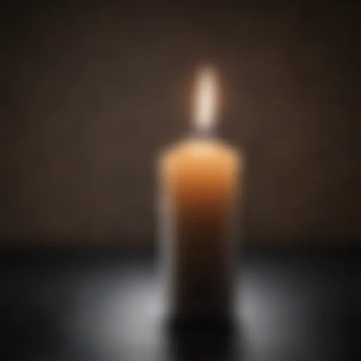 A close-up of a lit candle representing resilience in tough times