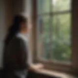 A solitary figure gazing out a window, reflecting on their emotions.