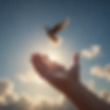 An open hand releasing a bird into the sky, illustrating liberation